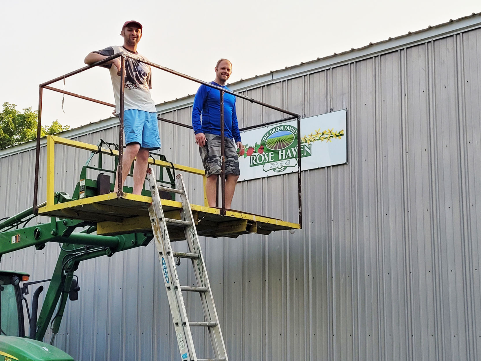 Putting up sign.jpg
